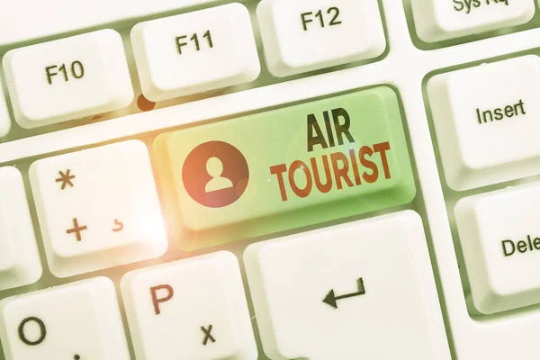 Sözcük yazma Air Turist. Beyaz arkaplan anahtar alanının üzerinde boş not kağıdı bulunan herhangi bir uçan nesne tarafından bir yerden bir yere gitmek için iş konsepti. — Stok fotoğraf
