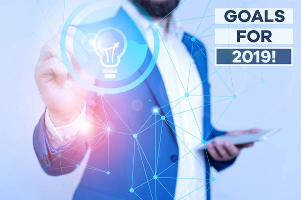 Handwriting text writing Goals For 2019. Concept meaning object of demonstratings ambition or effort aim or desired result Male human wear formal work suit presenting presentation using smart device. — Stockfoto