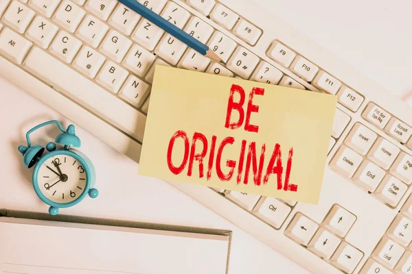 Conceptual hand writing showing Be Original. Business photo text created directly and demonstratingally by an artist Not a imitation Flat lay above empty note paper on pc keyboard pencils and clock. — Stockfoto