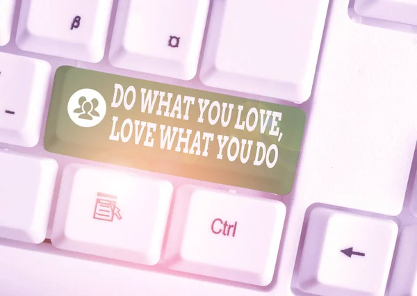 Handwriting text Do What You Love Love What You Do. Concept meaning you able doing stuff you enjoy it to work in better places then White pc keyboard with empty note paper above white background key c