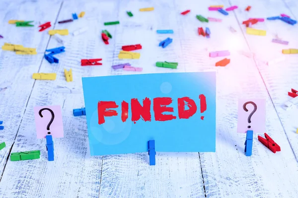 Text sign showing Fined. Conceptual photo clarify beer by causing precipitation of sediment during production Scribbled and crumbling sheet with paper clips placed on the wooden table. — 스톡 사진