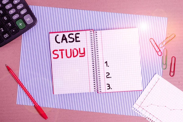 Text sign showing Case Study. Conceptual photo analysis and a specific research design for examining a problem Striped paperboard notebook cardboard office study supplies chart paper.