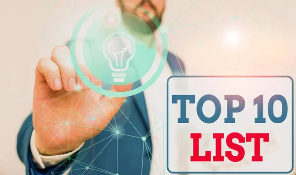 Writing note showing Top 10 List. Business photo showcasing the ten most important or successful items in a particular list Male human wear formal suit presenting using smart device. — Stock Photo, Image