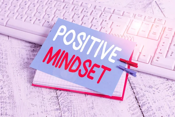 Writing note showing Positive Mindset. Business photo showcasing mental attitude in wich you expect favorable results notebook reminder clothespin with pinned sheet light wooden. — Stock Photo, Image