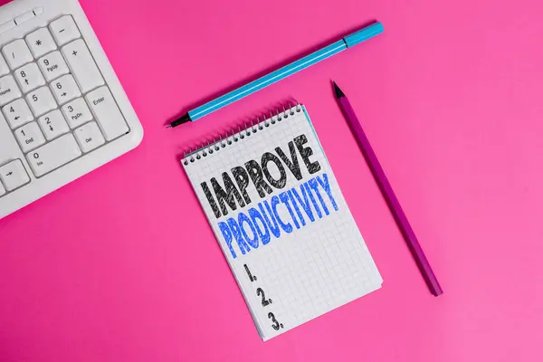 Conceptual hand writing showing Improve Productivity. Business photo showcasing to increase the machine and process efficiency Writing equipments and computer stuff placed on plain table. — Stockfoto