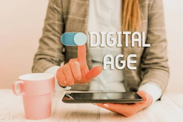 Text sign showing Digital Age. Conceptual photo introduction of the demonstratingal computer with subsequent technology Business woman sitting with mobile phone and cup of coffee on the table.