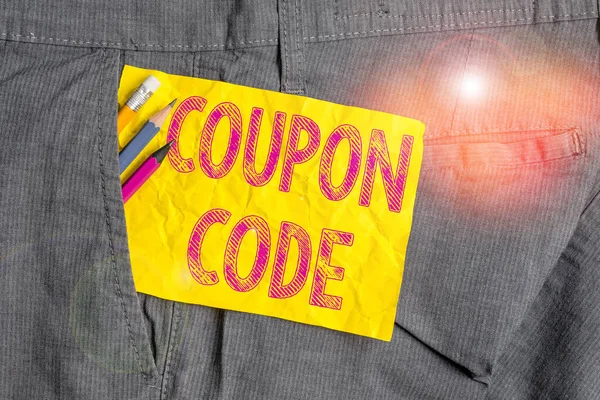 Word writing text Coupon Code. Business concept for ticket or document that can be redeemed for a financial discount Writing equipment and yellow note paper inside pocket of man work trousers.