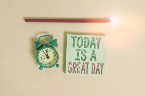 Word writing text Today Is A Great Day. Business concept for Enjoying the moment great weather Having fun Metal vintage alarm clock wakeup blank notepad marker colored background. — Stockfoto