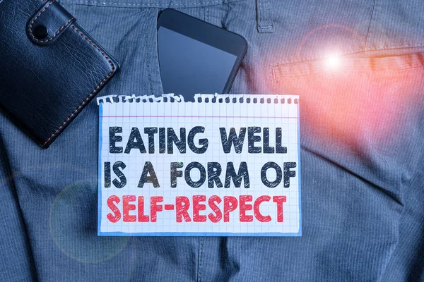Pisząc notatkę pokazującą, że jedzenie dobrze jest formą szacunku dla samego siebie. Biznesowe zdjęcie prezentujące ofertę promowania zdrowego stylu życia Smartphone urządzenie wewnątrz spodni przednia kieszeń z portfelem. — Zdjęcie stockowe