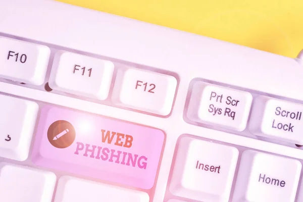 Writing note showing Web Phishing. Business photo showcasing fraudulent attempt to obtain sensitive details by disguising White pc keyboard with note paper above the white background.