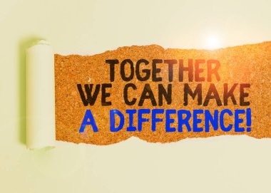 Writing note showing Together We Can Make A Difference. Business photo showcasing be very important some way in like team or group Cardboard which is torn placed above a wooden classic table. clipart