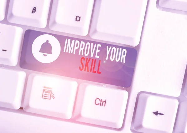 Text sign showing Improve Your Skill. Conceptual photo Unlock Potentials from Very Good to Excellent to Mastery White pc keyboard with empty note paper above white background key copy space.