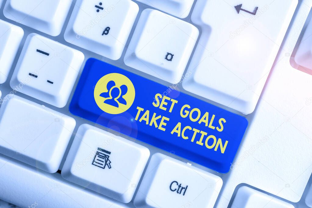 Handwriting text writing Set Goals Take Action. Concept meaning Act on a specific and clearly laid out plans White pc keyboard with empty note paper above white background key copy space.
