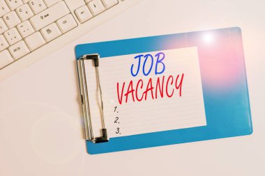 Word writing text Job Vacancy. Business concept for job that no one is doing and available for someone to do Flat lay above table with pc keyboard and copy space note paper.