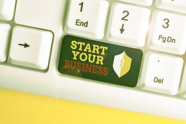 Text sign showing Start Your Business. Conceptual photo going into a New Venture Create New Product Services White pc keyboard with empty note paper above white background key copy space.
