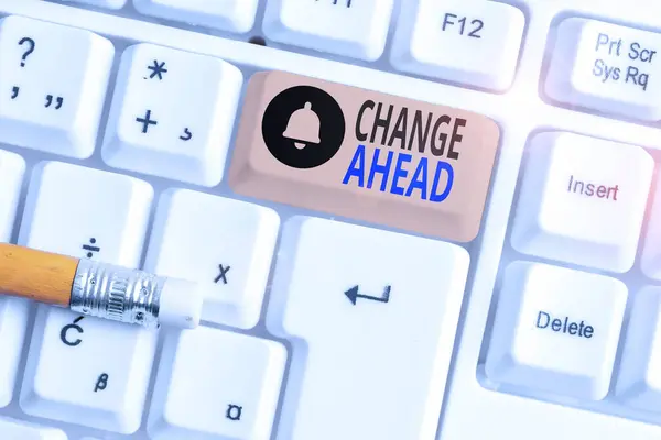 Writing note showing Change Ahead. Business photo showcasing to replace with or exchange for another Become different White pc keyboard with note paper above the white background. — Stock Photo, Image