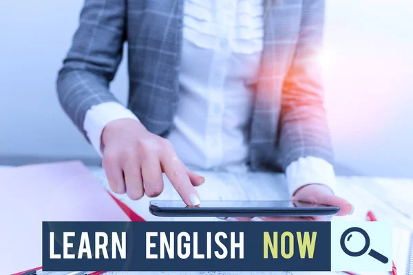 Conceptual hand writing showing Learn English Now. Business photo text gain or acquire knowledge and skill of english language Business concept with mobile phone in the hand. — 스톡 사진