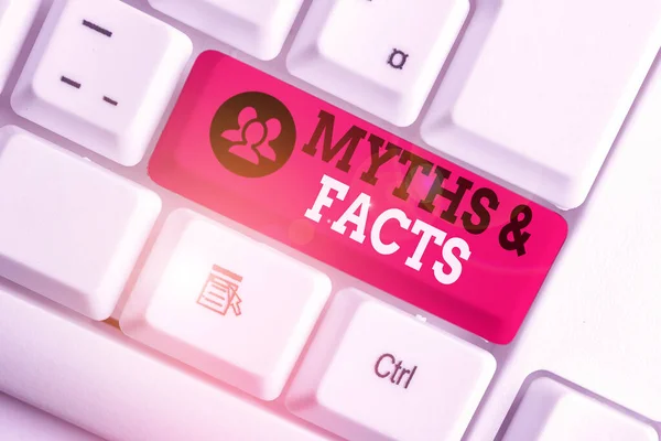 Handwriting text Myths And Facts. Concept meaning usually traditional story of ostensibly historical events White pc keyboard with empty note paper above white background key copy space.