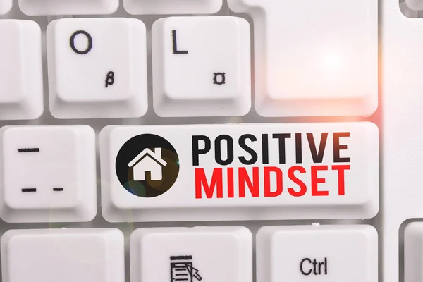 Word writing text Positive Mindset. Business concept for mental attitude in wich you expect favorable results White pc keyboard with empty note paper above white background key copy space.