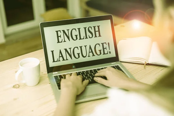 Word writing text English Language. Business concept for third spoken native lang in world after Chinese and Spanish woman laptop computer smartphone mug office supplies technological devices. — Stockfoto