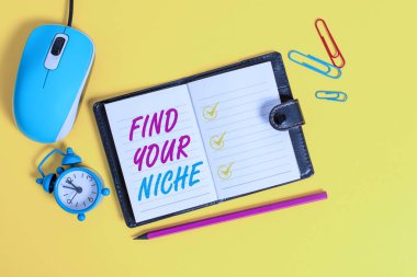 Word writing text Find Your Niche. Business concept for Market study seeking specific potential clients Marketing Locked diary sheets clips marker mouse alarm clock colored background.