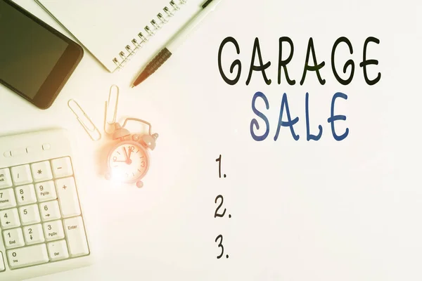 Conceptual hand writing showing Garage Sale. Business photo showcasing sale of miscellaneous household goods often held in the garage Business concept with space for advertising and text message. — Stok fotoğraf