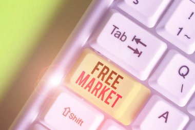 Writing note showing Free Market. Business photo showcasing an unregulated system of economic exchange or free competition.