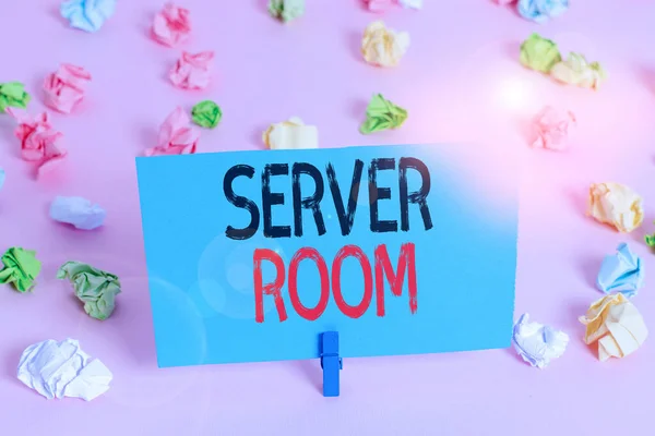 Handwriting text Server Room. Concept meaning a room used to store power and operate computer servers Colored crumpled papers empty reminder pink floor background clothespin.