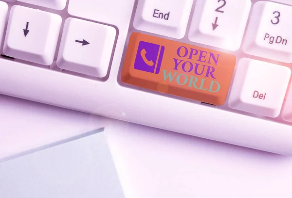 Text sign showing Open Your World. Conceptual photo Broaden your mind and mentality from any negativity White pc keyboard with empty note paper above white background key copy space.