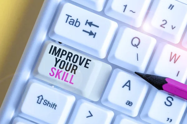 Handwriting text Improve Your Skill. Concept meaning Unlock Potentials from Very Good to Excellent to Mastery White pc keyboard with empty note paper above white background key copy space.