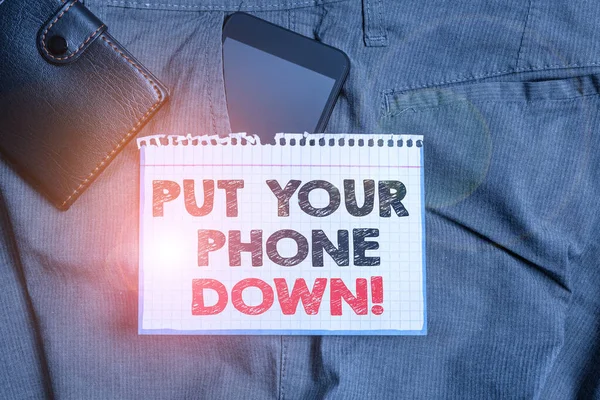 Writing note showing Put Your Phone Down. Business photo showcasing end telephone connection saying goodbye caller Smartphone device inside trousers front pocket with wallet. — 스톡 사진