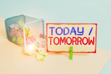 Writing note showing Today Or Tomorrow. Business photo showcasing What is happening now and what the future will bring Trash bin crumpled paper clothespin reminder office supplies.