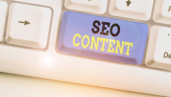 Handschrift tekst schrijven Seo Content. Concept betekent het creëren van inhoud die webpagina 's helpt om hoog te scoren op zoek. — Stockfoto