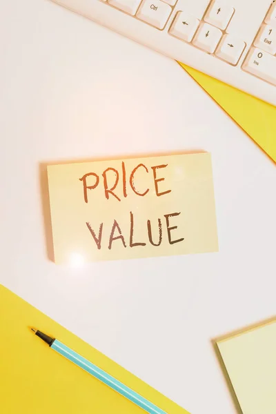 Text sign showing Price Value. Conceptual photo the price of a product based on what customers think or valued Flat lay above table with pc keyboard and copy space paper for text messages.