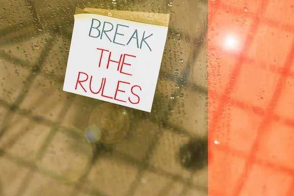 Writing note showing Break The Rules. Business photo showcasing Make changes do everything different Rebellion Reform Square paper piece notation stick to textured glass window. — Stock Photo, Image