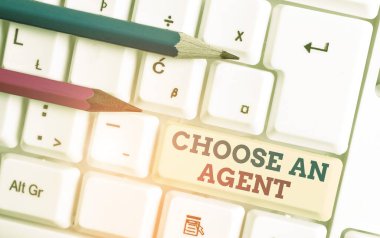 Writing note showing Choose An Agent. Business photo showcasing Choose someone who chooses decisions on behalf of you White pc keyboard with note paper above the white background. clipart