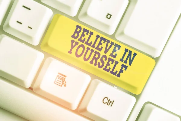 Text sign showing Believe In Yourself. Conceptual photo Encouraging someone Selfconfidence Motivation quote White pc keyboard with empty note paper above white background key copy space. — Stock Photo, Image