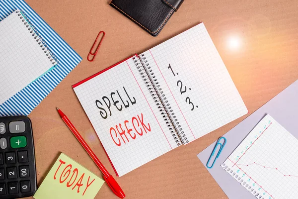 Text sign showing Spell Check. Conceptual photo to use a computer program to find and correct spelling errors Striped paperboard notebook cardboard office study supplies chart paper. — Stock Photo, Image