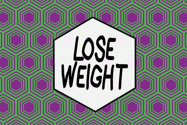 Word writing text Lose Weight. Business concept for the fact of a demonstrating s is or an animal s is body weight becoming less Repeating geometrical rhombus pattern. Seamless abstract design. Wallpa