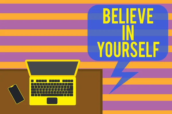 Writing note showing Believe In Yourself. Business photo showcasing Encouraging someone Selfconfidence Motivation quote Office working place laptop lying wooden desk smartphone. — Stock Photo, Image