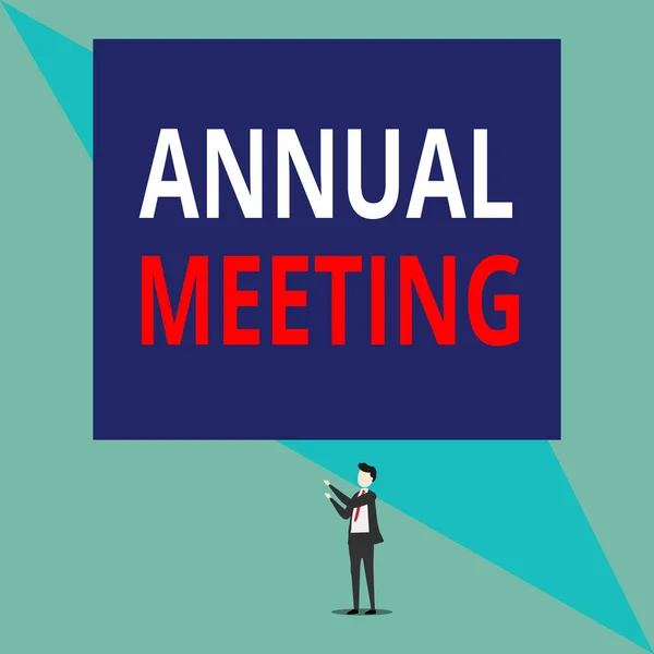Writing note showing Annual Meeting. Business photo showcasing yearly meeting of the general membership of an organization Isolated view man standing pointing upwards two hands big rectangle.