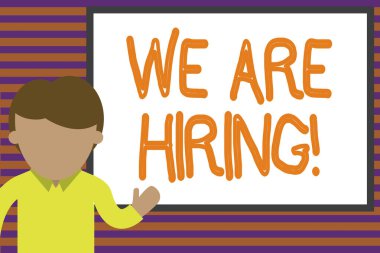 Text sign showing We Are Hiring. Conceptual photo recently you employ someone or pay someone to do particular job Young man standing in front whiteboard pointing to project. photo Art.