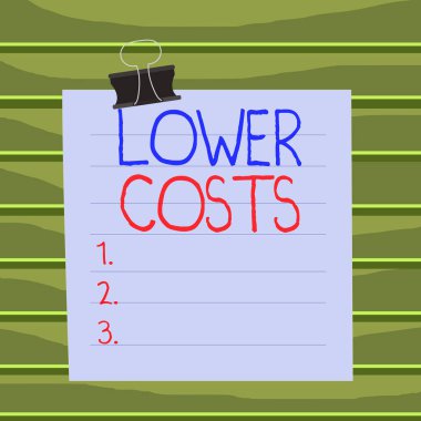 Conceptual hand writing showing Lower Costs. Business photo showcasing the business sets low price to enhance theproduct deanalysisd Paper lines binder clip suare notebook color background.