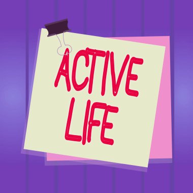 Writing note showing Active Life. Business photo showcasing way of life that integrates physical activity into your everyday Paper stuck binder clip colorful background reminder memo office supply.
