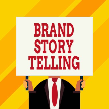Brand Story Tell 'i gösteren kavramsal el yazısı. Bir markaya nefes aldıran bir hayat gösteren iş fotoğrafı Çekici bir içerik Sadece erkek göğsü büyük bir dikdörtgen tutan koyu takım elbise giymiş.