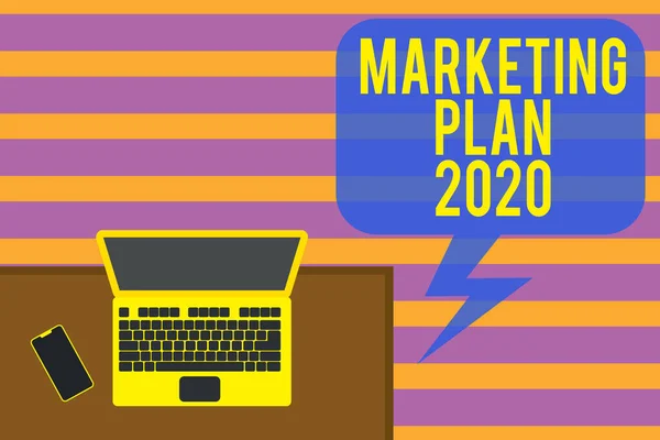 Writing note showing Marketing Plan 2020. Business photo showcasing schedule defining brand selling way in next year Office working place laptop lying wooden desk smartphone. — Stok fotoğraf