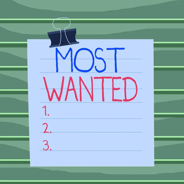 Scrittura concettuale a mano che mostra Most Wanted. Business foto in mostra elenco dei nomi delle dimostrazioni che vengono urgentemente ricercati Linee di carta legante clip suare notebook colore di sfondo . — Foto Stock