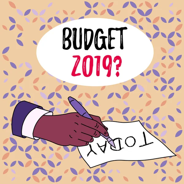 Conceptual hand writing showing Budget 2019 Question. Business photo text estimate of income and expenditure for next year Male Hand Formal Suit Holding Ballpoint Pen Piece of Paper Writing.