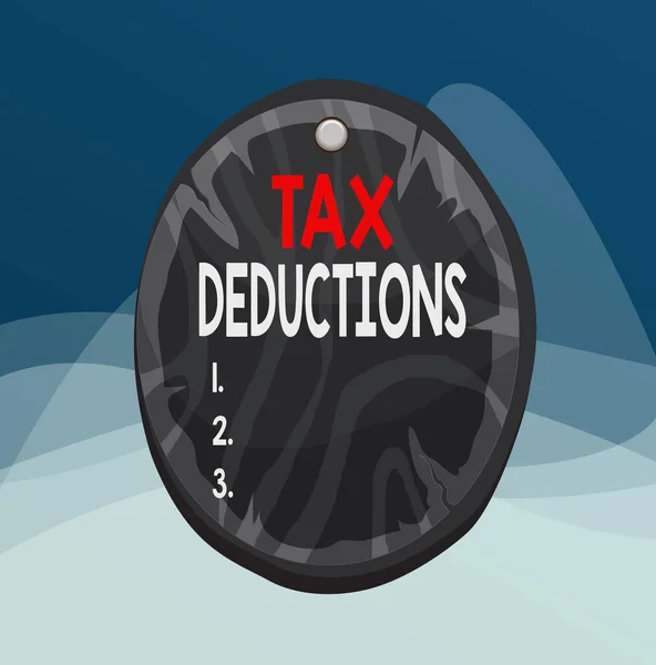 Writing note showing Tax Deductions. Business photo showcasing an amount or cost that subtracted from someone s is income Oval plank round wooden board circle shaped wood background. — Stockfoto