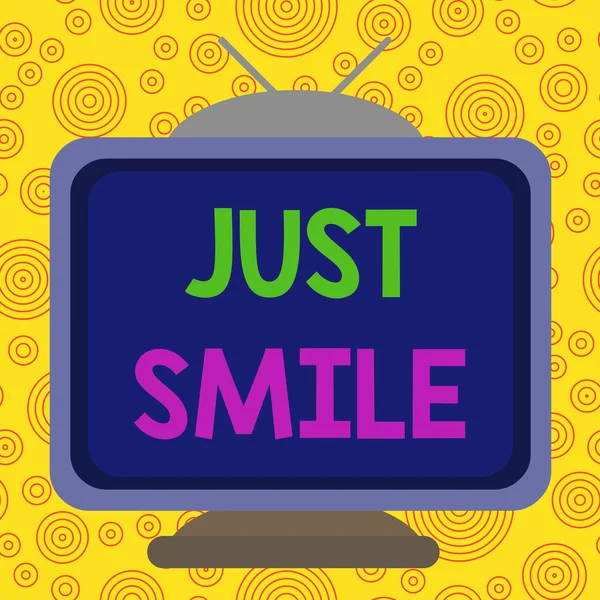 Text sign showing Just Smile. Conceptual photo assume a facial expression indicating pleasure or amusement Square rectangle old multicoloured painting television picture wood design. — Stock Photo, Image